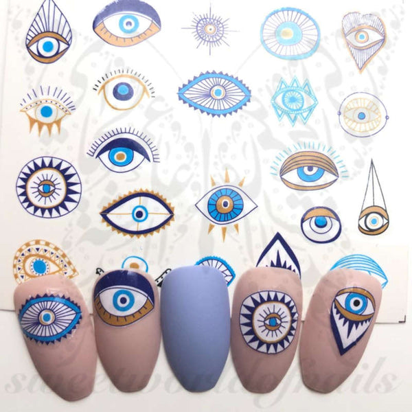 blue evil eye nail art