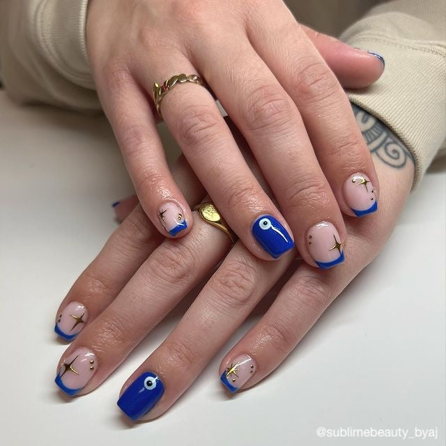 blue evil eye nail art