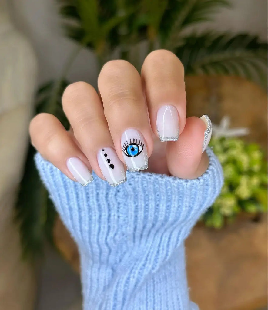 blue evil eye nail art