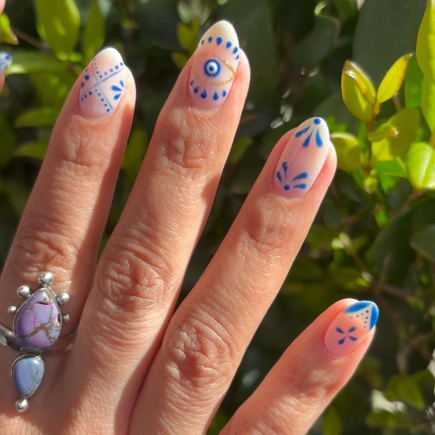 blue evil eye nail art