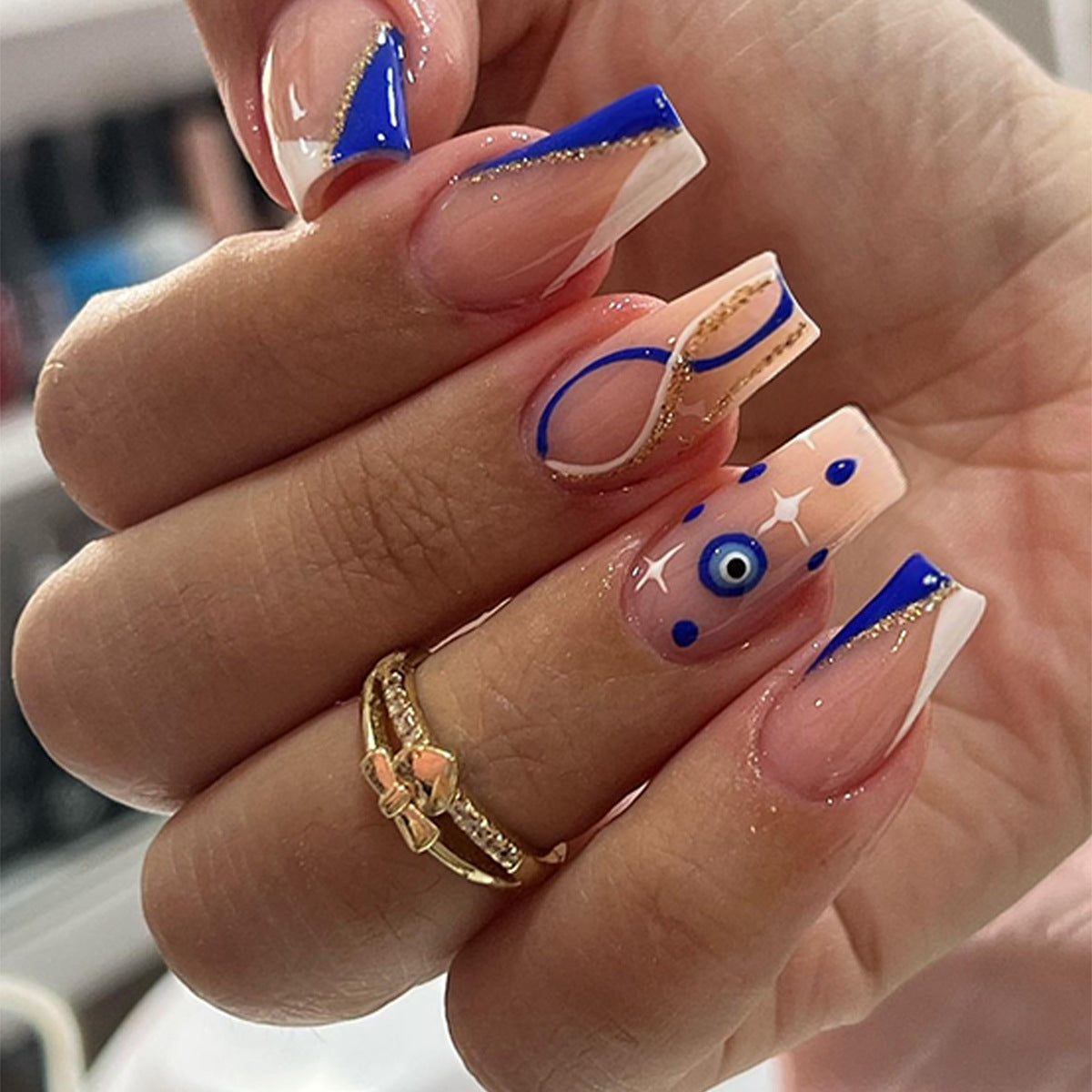 blue evil eye nail art
