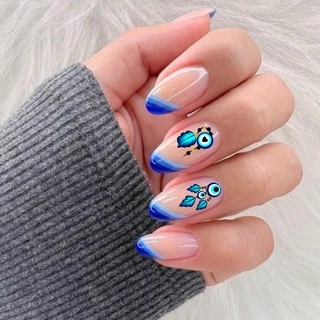unha decorada azul olho grego