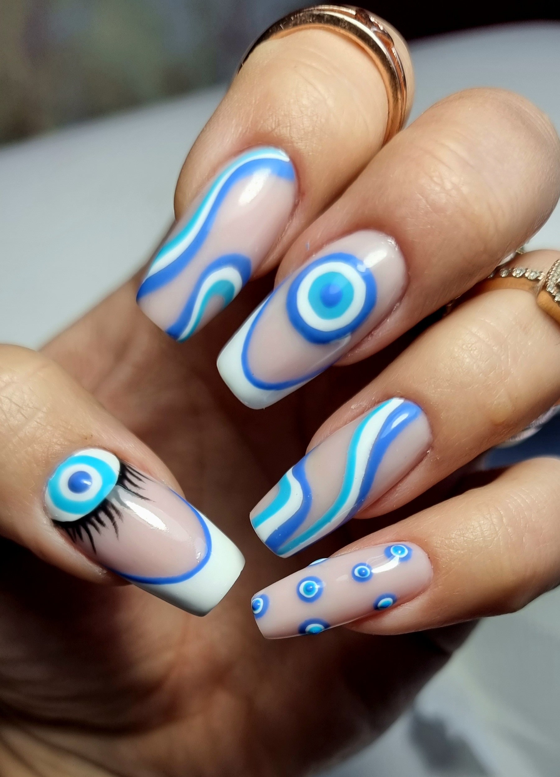 blue evil eye nail art