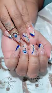 unha decorada azul olho grego