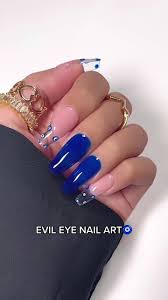 blue evil eye nail art