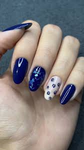 unha decorada azul olho grego