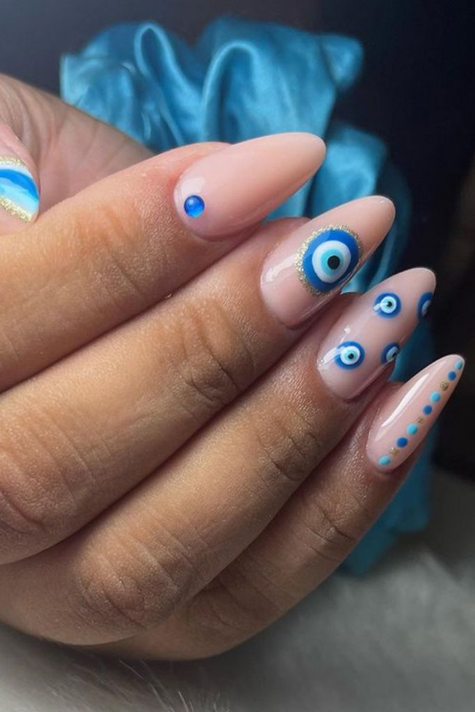 blue evil eye nail art