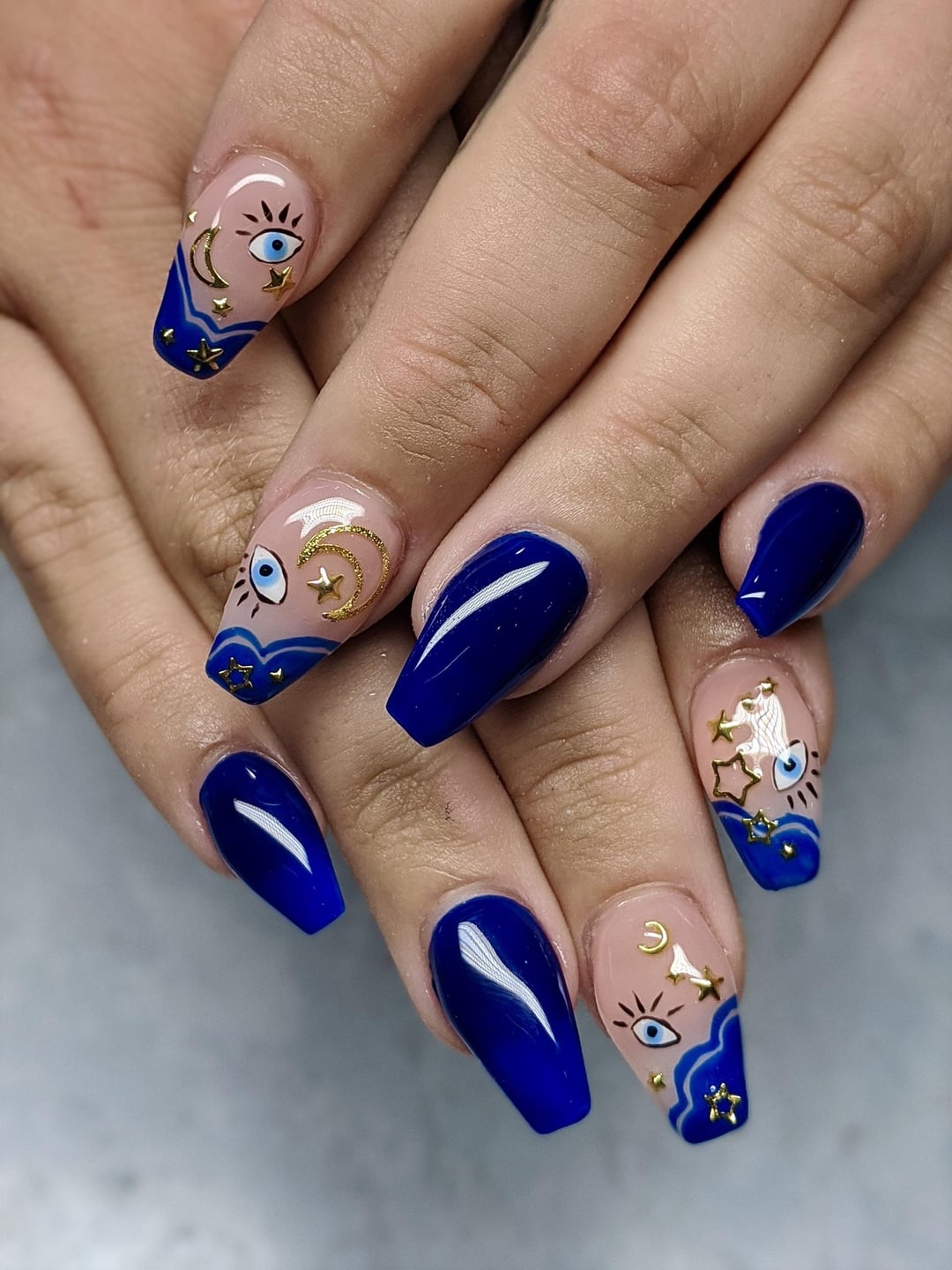 blue evil eye nail art