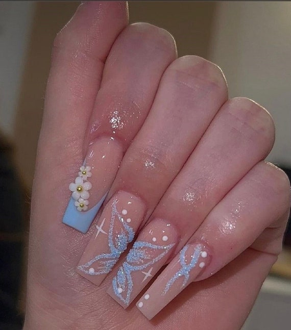 blue butterfly nail art