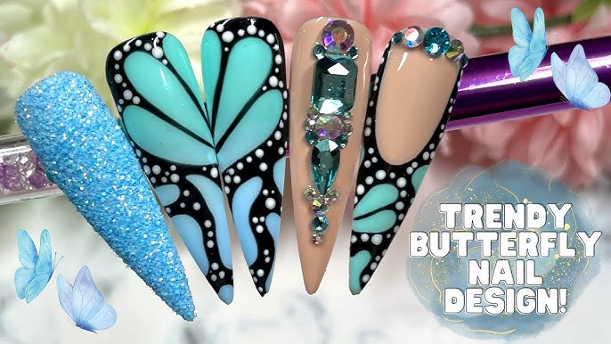 blue butterfly nail art