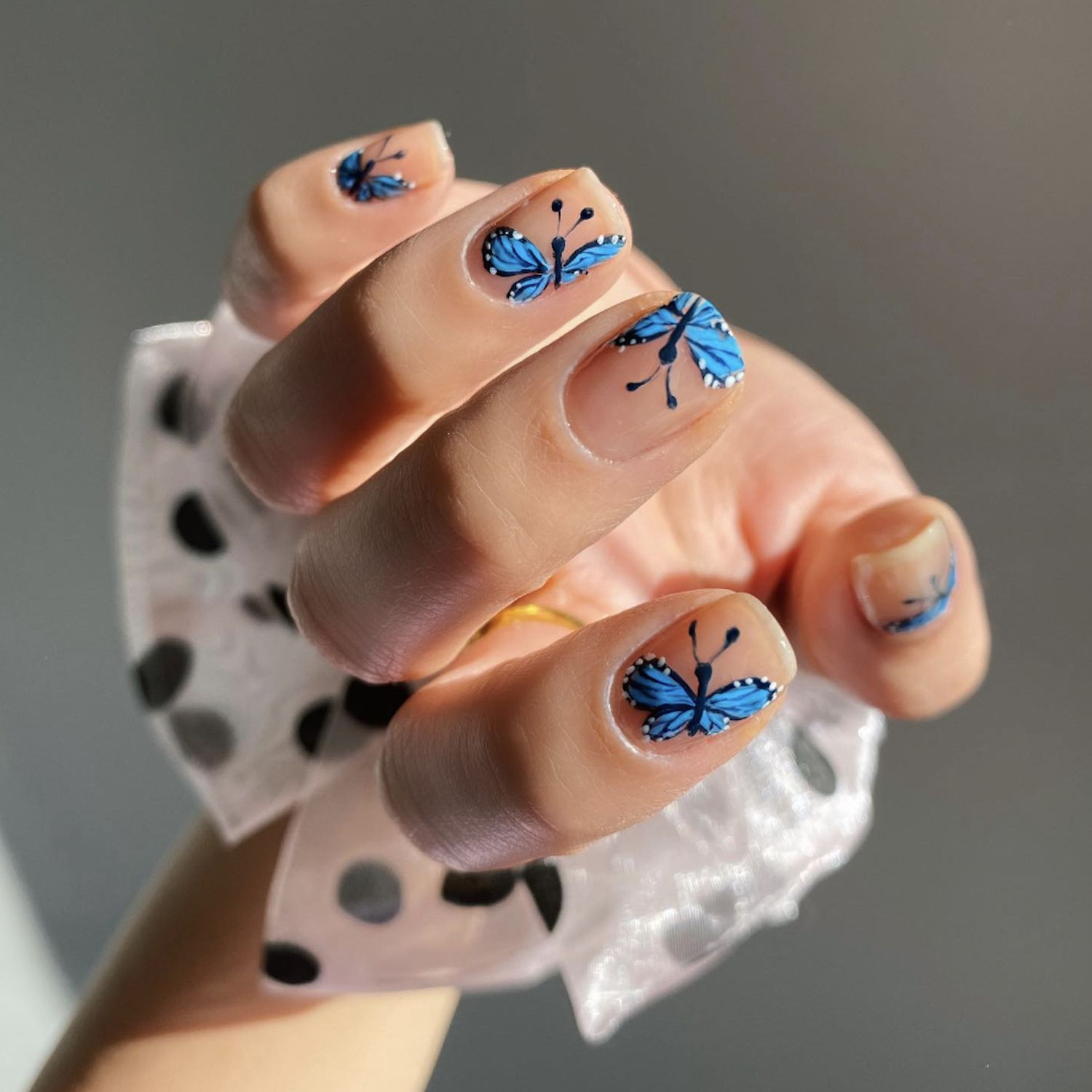 blue butterfly nail art