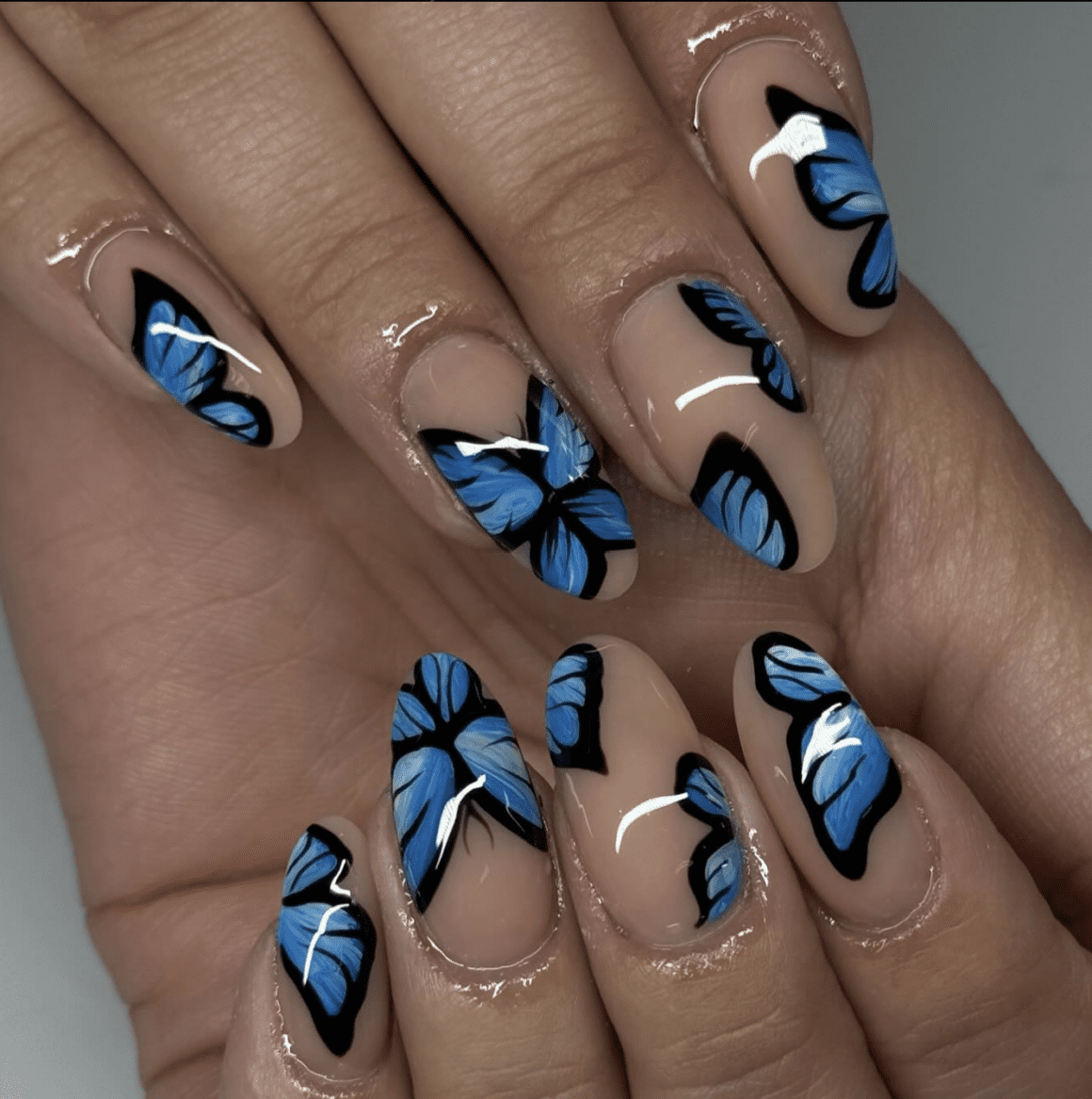 blue butterfly nail art
