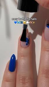 blue butterfly nail art