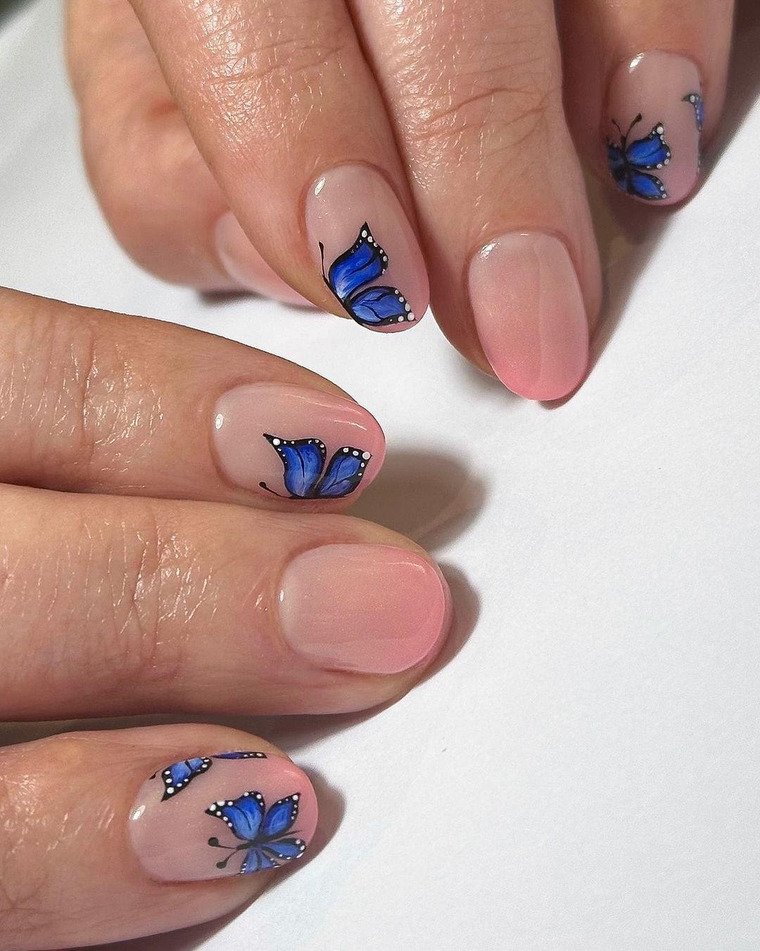 blue butterfly nail art