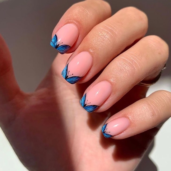 blue butterfly nail art
